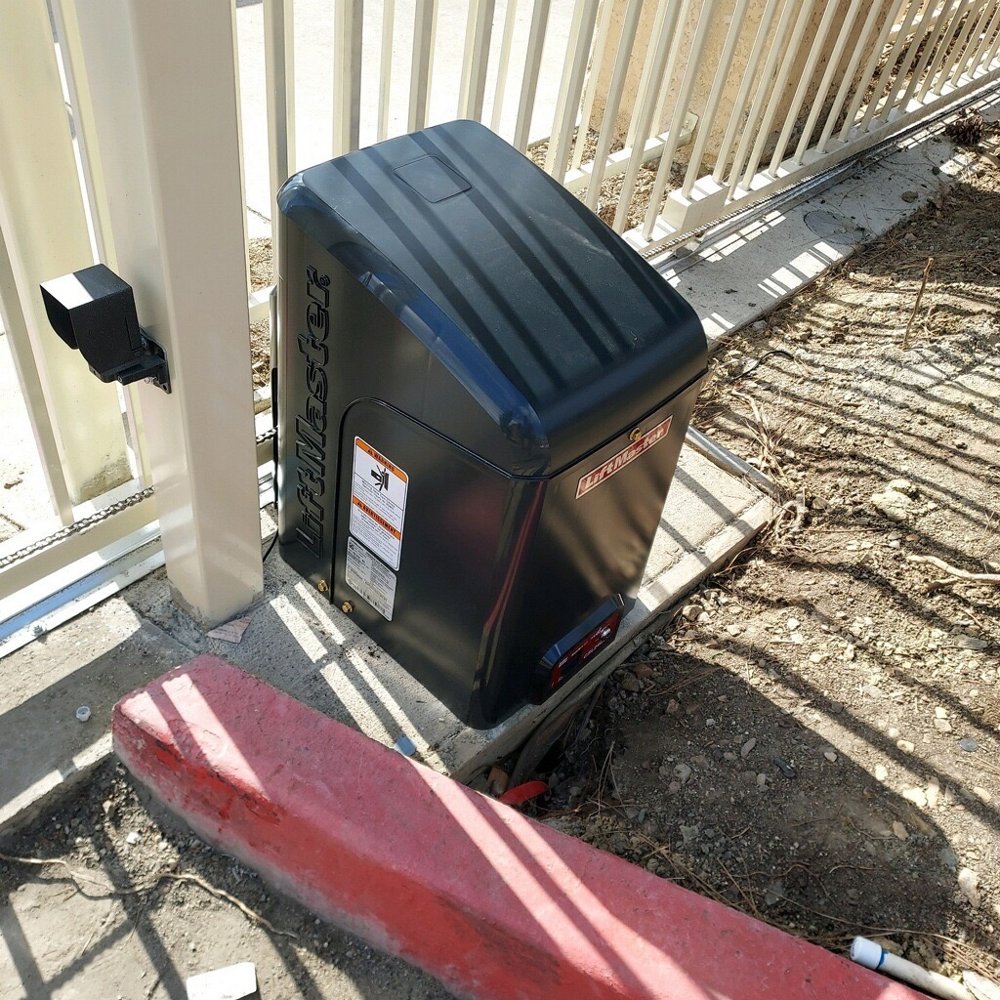 Automatic LiftMaster gate opener installed on driveway gate